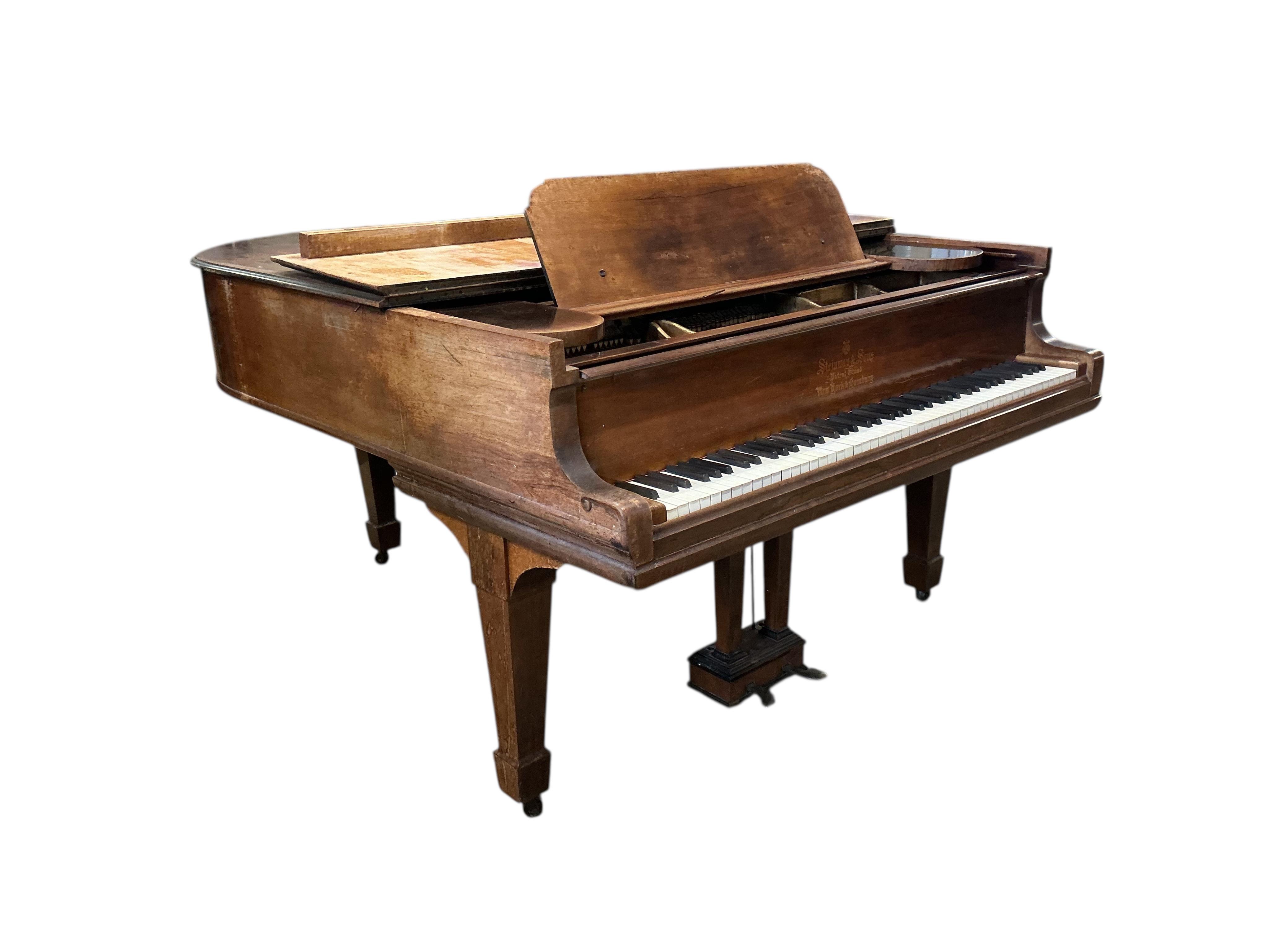 A Steinway rosewood grand piano, length 180cm, width 143cm, height 98cm CITES Submission reference QSWF2A3L